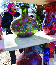 Small Business Saturday brings community, commerce together-Shoppers filled Sheppard Street on Nov. 29 for the Small Business Saturday Market hosted by RVA Galleries between Floyd and Ellwood avenues. The market featured 75 vendors offering everything from ceramics and fine art to spirits and locally made food. Rebecca Gunther explores local vendors. ((photo by Julianne Tripp Hillian/Richmond Free Press)