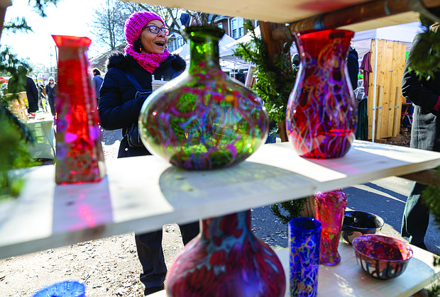 Small Business Saturday brings community, commerce together-Shoppers filled Sheppard Street on Nov. 29 for the Small Business Saturday Market hosted by RVA Galleries between Floyd and Ellwood avenues. The market featured 75 vendors offering everything from ceramics and fine art to spirits and locally made food. Rebecca Gunther explores local vendors. ((photo by Julianne Tripp Hillian/Richmond Free Press)