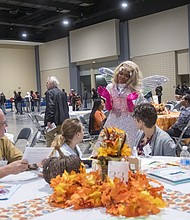 A Thanksgiving of service-The Giving Heart marked its 20th annual Thanksgiving Day Feast last Thursday at the Greater Richmond Convention Center, drawing more than 1,000 people to the exhibit hall for a day centered on meals and community connection. (photo by Sandra Sellars/Richmond Free Press)