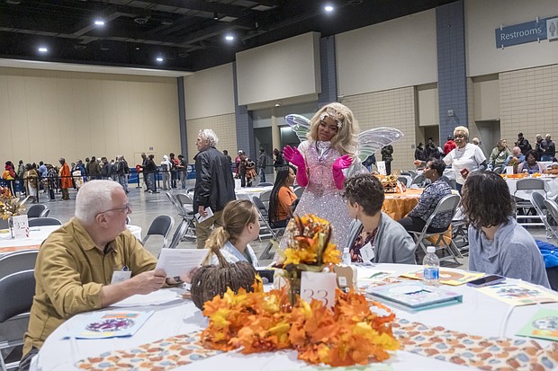 A Thanksgiving of service-The Giving Heart marked its 20th annual Thanksgiving Day Feast last Thursday at the Greater Richmond Convention Center, drawing more than 1,000 people to the exhibit hall for a day centered on meals and community connection. (photo by Sandra Sellars/Richmond Free Press)