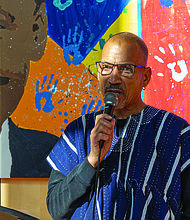 Lighting the way for healing and change-In Richmond, the Drums No Guns Foundation recently celebrated a $96,638 Health Equity Fund grant from the Richmond and Henrico Public Health Foundation to support youth mental and behavioral health in schools affected by community violence. The year-long project, led by Ram Bhagat and coordinated by Kiran Bhagat, brings restorative justice practices to Martin Luther King Jr. Middle School, in
collaboration with community-based educators, artists and public health partners. Ram Bhagat speaks at a news conference on Nov. 10 at Martin
Luther King Jr. Middle School where the Drums No Guns Foundation announced the awarding of the grant. (Photo by Julianne Tripp Hillian/Richmond Free Press)