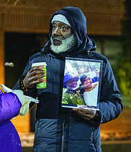 Lighting the way for healing and change-Henrico County’s held its annual Candlelight & Ribbon Tying Ceremony on Tuesday to honor homicide victims. Sponsored by the Henrico County Commonwealth’s Attorney’s Victim/Witness Program, the event featured prayer, remarks from friends and family of the deceased, a memorial board of photographs and a memorial tree where participants placed the names of those they have lost. Early reports show the county has recorded just two homicides through December 2025, down from 22 during the same period last year — a potential 91% decrease if the trend holds through year’s end. Shakim “Shaka” Woodberry holds a framed photo of him and his daughter at the ceremony Dec. 2 outside the government center. She was killed in 2019. Woodberry has since helped found Fathers Advocating Community Teamwork Solutions, a group working to turn “pain into progress.” (Photo by Julianne Tripp Hillian/Richmond Free Press)
