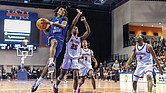 Ahmad Britt #23 of John Marshall High School drives to the basket during the “Battle of Richmond” at the VSU Multipurpose Center on Saturday, Dec. 6. John Marshall defeated Richmond School for the Arts 78-51.