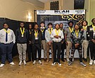 Maxie Team awardees for 2025 gather for a group photo during the third annual Maxie Awards banquet at the Robinson Theater Community Arts Center on Dec. 3. Pictured are Marcus Gibson, Emanuel Simms, Donzell Jones
Teal, Shadarius Pickett, Henry Nolan, Mac Nolan, Avari Hornes, Ronald Jackson, Kevin Mosby and Devon Epps of Armstrong High School and Demarcus Brown and Hezikiah Anderson of Richmond High School for the Arts.