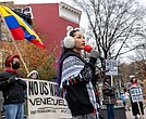 Alyssa Gonzalez speaks Saturday, Dec. 6 during a rally at Maggie Walker Memorial Plaza organized by the Richmond branch of the Party for Socialism and Liberation. The rally was part of a nationwide day of action regarding U.S. policy toward Venezuela.
