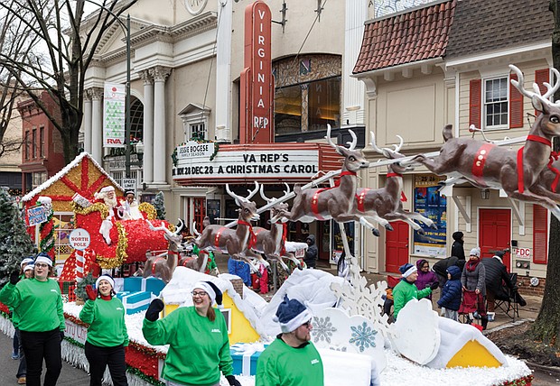 Christmas on Broad Street-The 42nd annual Dominion Energy Christmas Parade returned to Broad Street in Richmond on Saturday, Dec. 6. The parade began at 10 a.m. at the Science Museum of Virginia and continued east to Seventh Street. The Atlantic Union Bank float closed out the parade with Santa, joined by Mayla Lemu, a junior at Douglas S. Freeman High School and the Science Museum’s 2025 snow ambassador. (photo by Julianne Tripp Hillian/Richmond Free Press)