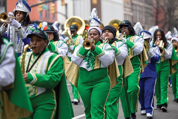 Christmas on Broad Street-The 42nd annual Dominion Energy Christmas Parade returned to Broad Street in Richmond on Saturday, Dec. 6. The parade began at 10 a.m. at the Science Museum of Virginia and continued east to Seventh Street. The Richmond Public Schools All City Marching Band brings a burst of sound down Broad Street as students perform in the parade. (photo by Julianne Tripp Hillian/Richmond Free Press)