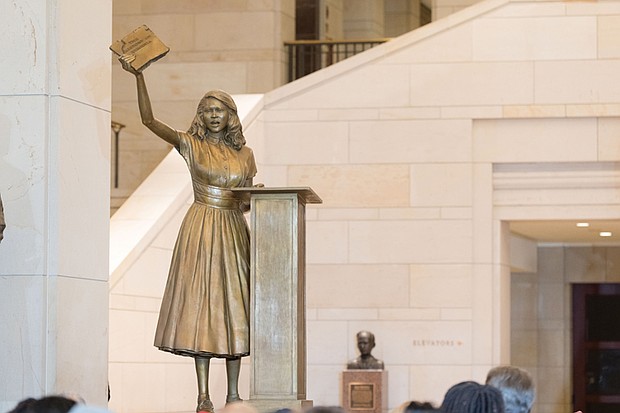 The U.S. Capitol on Tuesday unveiled a statue of teenaged Barbara Rose Johns protesting poor conditions at her segregated Virginia high school, replacing a statue of Robert E. Lee, who led Confederate forces, removed years ago.