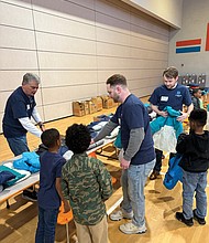Community efforts bring warmth to students-Community groups and organizations stepped in last week to help Richmond students stay warm as colder weather sets in, with two separate coat distribution efforts
reaching hundreds of children. Diversified Energy, a natural gas and oil company, partnered with Operation Warm to provide 527 new coats to students at Henry L. Marsh III Elementary School. The event marked the fifth year of the partnership, which focuses on distributing new winter clothing to children in under-resourced communities. Diversified Energy employees handed out the coats ahead of the winter months. Diversified Energy employees hand out new winter coats to students at Henry L. Marsh III Elementary School as part of the company’s partnership with Operation Warm.
