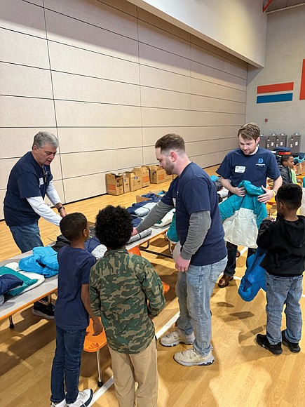 Community efforts bring warmth to students-Community groups and organizations stepped in last week to help Richmond students stay warm as colder weather sets in, with two separate coat distribution efforts
reaching hundreds of children. Diversified Energy, a natural gas and oil company, partnered with Operation Warm to provide 527 new coats to students at Henry L. Marsh III Elementary School. The event marked the fifth year of the partnership, which focuses on distributing new winter clothing to children in under-resourced communities. Diversified Energy employees handed out the coats ahead of the winter months. Diversified Energy employees hand out new winter coats to students at Henry L. Marsh III Elementary School as part of the company’s partnership with Operation Warm.