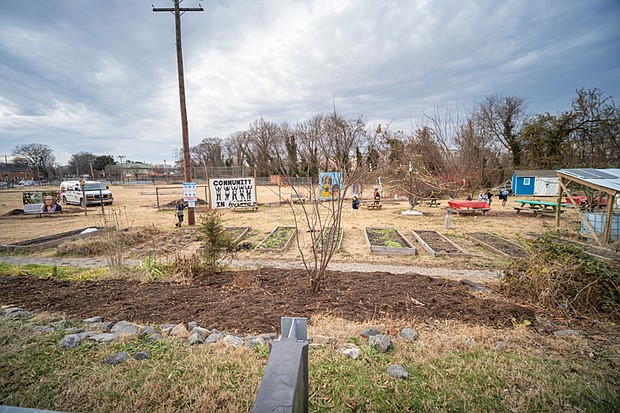 Cityscape Slices of life and scenes in Richmond-The city, in partnership with the Public Art Commission and Gilpin Community Farm, unveiled the installation, which features carved relief botanical and historical motifs honoring visionary Gilpin residents Charles S. Gilpin and Lillie Estes, as well as local flora and fauna. The gateway and accompanying seating serve as a visual landmark celebrating creativity and community collaboration. (photo by Sandra Sellars/Richmond Free Press)