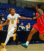 VCU’s Daija Preston, a freshman guard from Douglasville, Ga., drives the ball past a Georgia defender on Friday during the 4 Tha Culture Holiday Hoops Classic at the Henrico Sports & Events Center. Georgia won 72-53. VCU lost to Penn State 78-66 on Saturday.