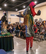 Honoring heritage with community and celebration-Stilted performers honor ancestors at the annual Capital City Kwanzaa Festival presented by the Elegba Folklore Society. (photo by Sandra Sellars/Richmond Free Press)