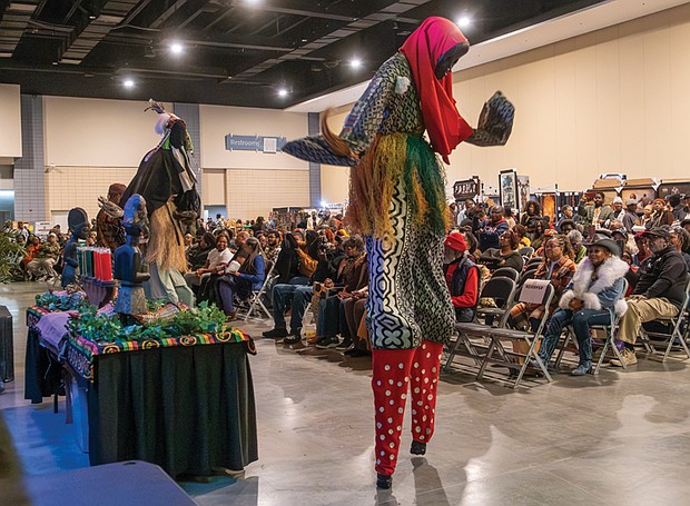 Honoring heritage with community and celebration-Stilted performers honor ancestors at the annual Capital City Kwanzaa Festival presented by the Elegba Folklore Society. (photo by Sandra Sellars/Richmond Free Press)