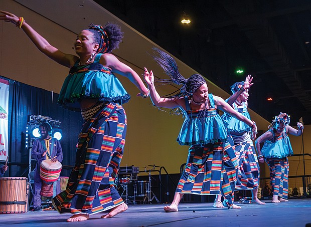 Honoring heritage with community and celebration-Members of the Elegba Folklore Society perform a traditional dance at the annual Capital City Kwanzaa Festival at the Greater Richmond Convention Center in downtown Richmond on Saturday, Dec. 27. (photo by Sandra Sellars/Richmond Free Press)