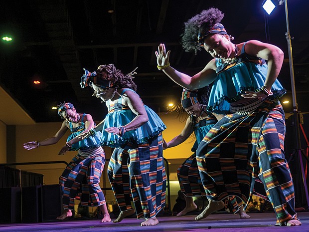 Honoring heritage with community and celebration-Members of the Elegba Folklore Society perform a traditional dance at the annual Capital City Kwanzaa Festival at the Greater Richmond Convention Center in downtown
Richmond on Saturday, Dec. 27. (photo by Sandra Sellars/Richmond Free Press)