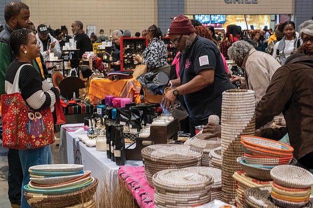 Honoring heritage with community and celebration-A crowded Ujamaa Market offered cultural merchandise throughout the day during the festival, which featured performances, workshops, children’s activities and African and Pan-African cuisine. (photo by Sandra Sellars/Richmond Free Press)