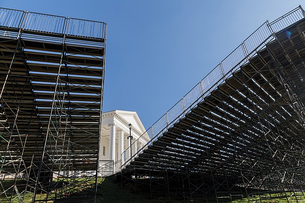 Cityscape Slices of life and scenes in Richmond-The stage is set for Virginia’s 75th governor, Abigail Spanberger, who will be sworn in Saturday, Jan. 17, 2026. Fencing and security measures have been installed outside the Capitol since late October. The event is open to the public, but a ticket lottery has been implemented due to limited seating. Lottery registration is available at spanbergerinauguration.com. (photo by Julianne Tripp Hillian/Richmond Free Press)