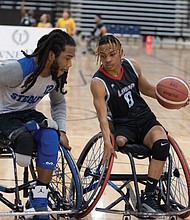 A Year in Focus-From marches to milestones, Richmond’s people and events shaped the year. Demonstrations, school celebrations, cultural festivals and sports brought the community together across the city. These images capture the moments that marked 2025 in Richmond. Khalil Harriot of the Shepherd Stealers defends Cameron Davis of the LWSRA Hawks during a Division II game at the National Wheelchair Basketball Adult Championships
on April 11 at the Henrico Sports & Events Center. (photo by Sandra Sellars/Richmond Free Press)