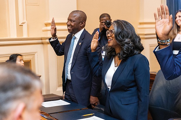 Ladies and gentlemen … start your terms- Virginia turns a page as lawmakers take their oaths and Gov. Abigail Spanberger was inaugurated last week. The first day of the 2026 General Assembly session on Jan. 14 saw delegates and state leaders assume their roles. Delegates Don Scott and Jackie Glass take the oath of office on the first day of the 2026 General Assembly session. (photo by Julianne Tripp Hillian/Richmond Free Press)