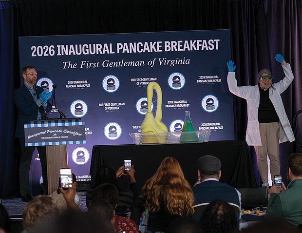 Inauguration festivities-Hundreds attended the Inaugural Ball at Main Street Station on Saturday, Jan. 17, 2026, as part of the weekend celebrating Gov. Abigail Spanberger’s historic inauguration. Spanberger addressed the crowd, followed by a short performance from Charlottesville-based musician Dave Matthews. The next day, hundreds gathered at the Science Museum of Virginia for the first First Gentleman’s Breakfast. With the help of celebrity Chef T (Torrece “T” Gregoire), of Fox show “Hell’s Kitchen,” First Gentleman Adam Spanberger made and tasted pancakes. First gentleman Adam Spanberger and Science Museum of Virginia Assistant Instructor of Education Laura Kramer conduct a Giant Elephant Ears science
experiment after the First Gentleman’s Breakfast.(photo by Sandra Sellars/Richmond Free Press)