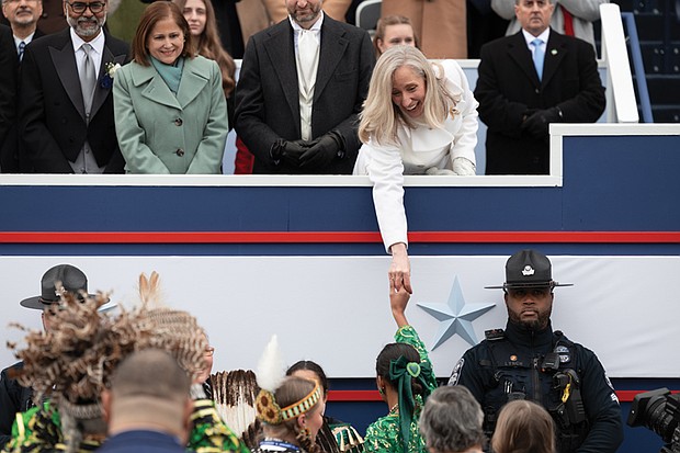 Ladies and gentlemen … start your terms- Virginia turns a page as lawmakers take their oaths and Gov. Abigail Spanberger was inaugurated last week. The first day of the 2026 General Assembly session on Jan. 14 saw delegates and state leaders assume their roles. Days later, Spanberger took the oath of office at the Virginia State Capitol in front of thousands, joined by Attorney General Jay C. Jones and Lt. Gov. Ghazala Hashmi. Gov. Spanberger greets members of Virginia’s Native
American Tribes after their performance. (photo by Julianne Tripp Hillian/Richmond Free Press)