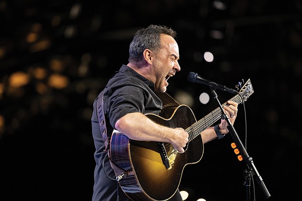 Inauguration festivities-Hundreds attended the Inaugural Ball at Main Street Station on Saturday, Jan. 17, 2026, as part of the weekend celebrating Gov. Abigail Spanberger’s historic inauguration. Spanberger
addressed the crowd, followed by a short performance from Charlottesville-based musician Dave Matthews. The next day, hundreds gathered at the Science Museum of Virginia for the first First Gentleman’s Breakfast. With the help of celebrity Chef T (Torrece “T” Gregoire), of Fox show “Hell’s Kitchen,” First Gentleman Adam Spanberger made and tasted pancakes. Dave Matthews performs a short solo set of his band’s songs at the inaugural ball. (photo by Julianne Tripp Hillian/Richmond Free Press)