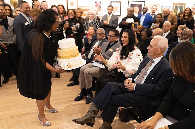 Art, history and service mark Wilder’s 95th-Guests fill the Black History Museum & Cultural Center of Virginia on Sunday to celebrate former Gov. L. Douglas Wilder’s 95th birthday, exploring his watercolor paintings and enjoying a program honoring the recipients of the inaugural National Ovation to Wilder scholarships. Former Gov. L. Douglas Wilder is presented with a cake during his 95th birthday celebration at the BHMVA. (Photos by Julianne Tripp Hillian/Richmond Free Press)