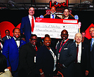 Live! Casino Virginia presents a $15 million check to the City of Petersburg as part of a multiyear benefits agreement. Some funds will support city initiatives, community programs and local nonprofits through a new advisory board. First row, left to right: City Manager March Altman, Councilman Arnold Westbrook Jr., Councilman Marlow Jones, Councilwoman Annette Smith-Lee, Vice Mayor Darrin Hill, Councilman Charlie Cuthbert, Councilman W. Howard Myers. Second row, left to right: Cordish Gaming Group President Rob Norton, Mayor Sam Parham, The Cordish Companies Principal Jon Cordish.