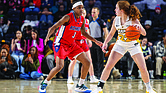 Laia Crespín (22) of Virginia Commonwealth University’s women’s basketball team defends the ball against Alicia Newell (3) of hometown rival Richmond at the Siegel Center on Feb. 1 during the third annual SupportHER game.