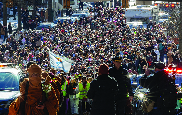Nineteen Buddhist monks reached Richmond on Tuesday, drawing thousands to City Hall on the 100th day of their 2,300-mile trek …