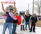 Yosmani Rafael Valdez, left, and other students at Lloyd C. Bird High School walk out of the school into snowy weather during a student-led demonstration Friday, Feb. 6, from 2:15 to 2:55 p.m. The walkout was part of coordinated demonstrations at high schools across Chesterfield County Public Schools focused on immigration issues. Julianne Tripp Hillian/Richmond Free Press
