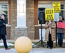 Superintendent Jason Kamras watched as members of the Richmond Education Association rallied outside River City Middle School on Monday to protest proposed cuts in the school division’s fiscal year 2027 budget ahead of a Richmond School Board town hall meeting. Julianne Tripp Hillian/Richmond Free Press
