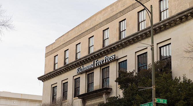 The Imperial Building, home to the Richmond Free Press. The honorary street sign on the 100 block of North Fifth Street was designated by
City Council in 2016 in honor of founder Raymond H. Boone Sr.