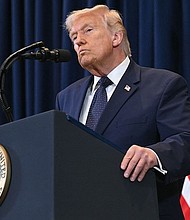 President Donald Trump speaks during a press conference at Trump National Doral in Miami, Florida, on March 9./