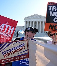 Demonstrators rally outside the US Supreme Court, before justices hear oral arguments on Wednesday./