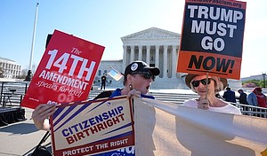 Demonstrators rally outside the US Supreme Court, before justices hear oral arguments on Wednesday./