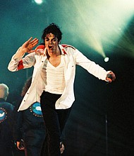 Jackson performing at London's Wembley Stadium in 1992, one year before the first major accusation against him. Jackson maintained his innocence.
