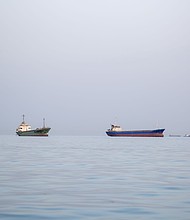 Ships are anchored near the shoreline on April 22, in Bandar Abbas, Iran. Bandar Abbas is a port city and the capital of Hormozgan Province, along the Persian Gulf and Strait of Hormuz.