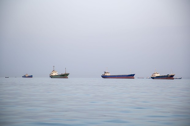 Ships are anchored near the shoreline on April 22, in Bandar Abbas, Iran. Bandar Abbas is a port city and the capital of Hormozgan Province, along the Persian Gulf and Strait of Hormuz.