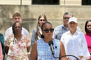Angel Carroll speaks at U.S. District Courthouse