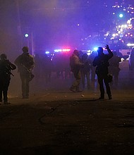 Federal agents and protesters