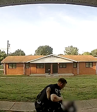 Viral video captured on a home security camera showed officer wrestling a Black woman to the ground and repeatedly punching her.