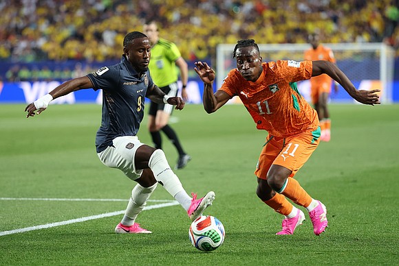 A sea of bright pink cleats has become one of the most unexpected trends of the 2026 World Cup, turning …