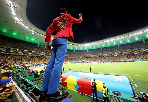 At the World Cup, the Democratic Republic of Congo’s return to football glory is being amplified by a striking superfan …
