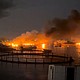 Smoke rises from a port near Strait of Hormuz in Kuhestak, Hormozgan Province, Iran after a US strike on July 8, 2026.