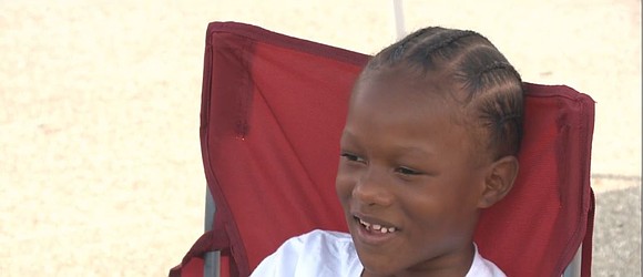 A determined 7-year-old Flint boy is turning pink lemonade into a powerful mission—raising money and awareness for sickle cell disease …