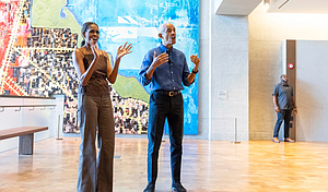 Former President Barack Obama and former first lady Michelle Obama welcome communit members in the Hope and Change lobbu before they walked through the museum at the new Presidential Center