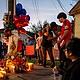 Family members of Lorenzo Salgado Araujo grieve at a makeshift memorial during a candlelight vigil on July 8 in Houston, Texas.