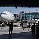 Venezuelan migrants repatriated from the US walk upon arrival at Simon Bolivar International Airport in Maiquetia, Venezuela, on June 17, 2025.